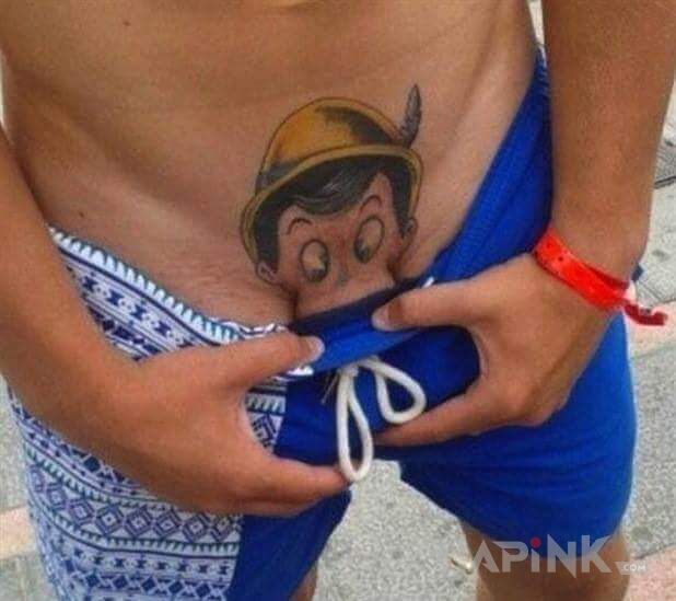 Tattoo Pinokio in characters motif and cartoon / comic book style on the stomach