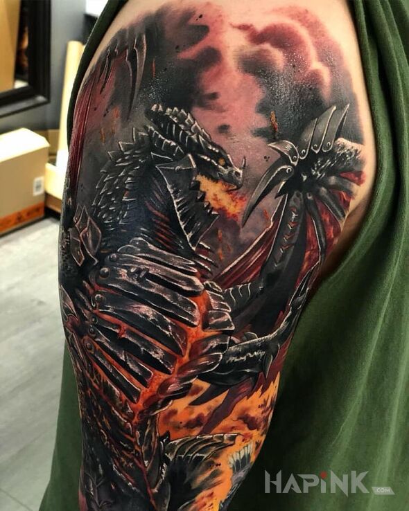 Tattoo Ognisty smok in dragons motif and realistic style on the upper arm