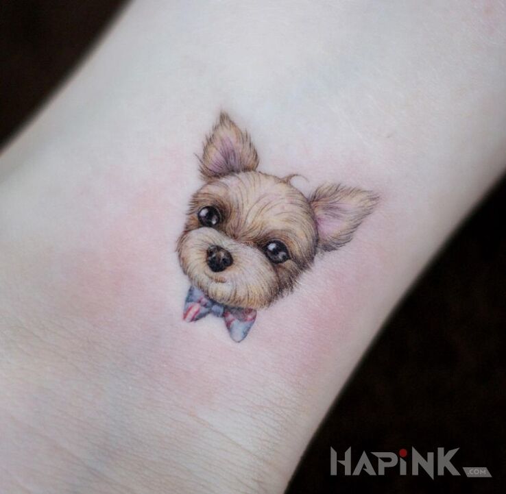 Tattoo Piesek in animals motif on the wrist