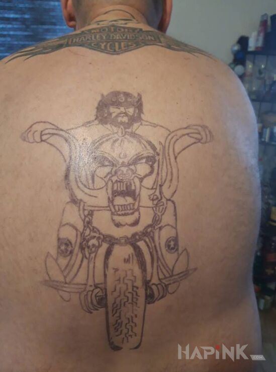 Tattoo Moto gang in black and gray motif on the back