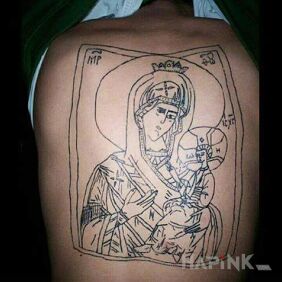 Tattoo Virgin Mary and baby Jesus :) on the back motif: characters