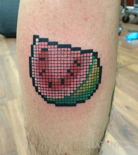 Tattoo Większy kawałek arbuza in colorful motif on the calf
