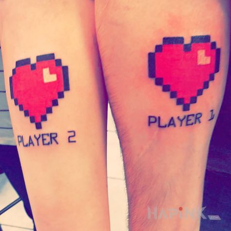 Tattoo Player 2 i player 1 in colorful motif on the forearm