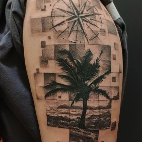 Tattoo Palm rose of the winds on the upper arm motif: flowers style: realistic