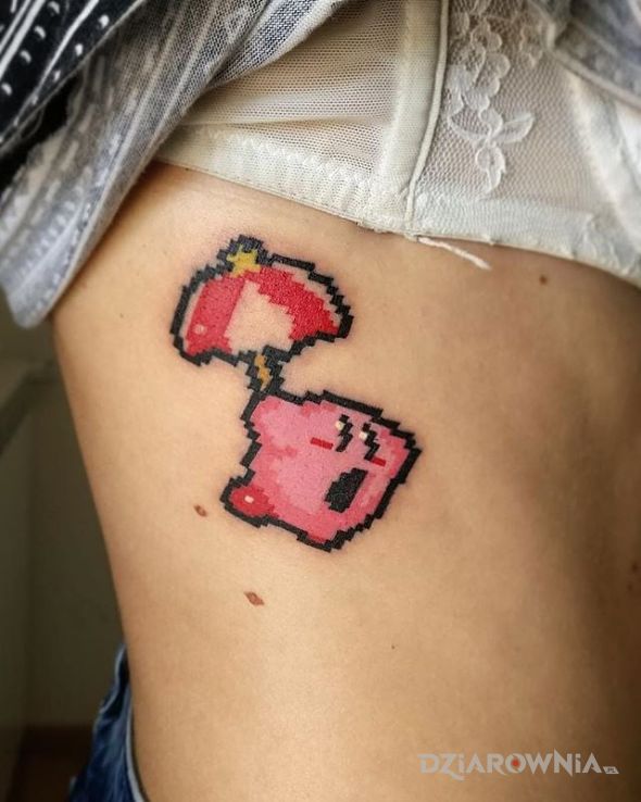 Tatuaż różowy pokemon w motywie postacie na żebrach