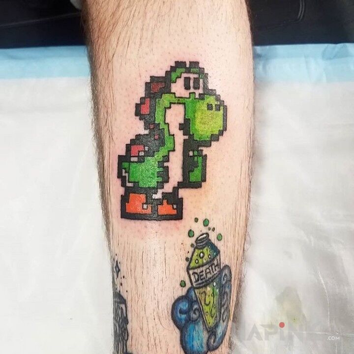 Tattoo Crock in pixelated motif on the calf
