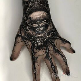 Tattoo Smiley on the hand motif: animals style: realistic