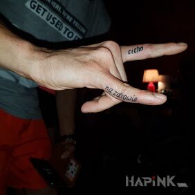 Tattoo On your toes on the fingers motif: lettering