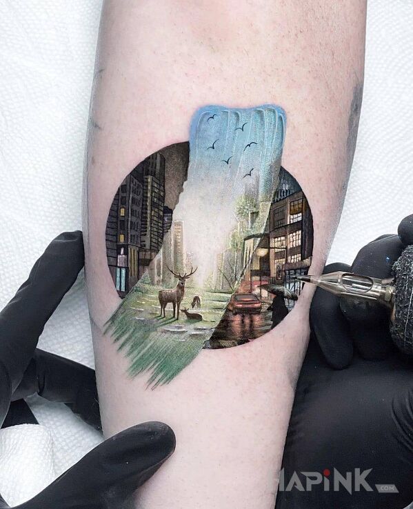 Tattoo Jeleń w mieście in animals motif and realistic style on the forearm