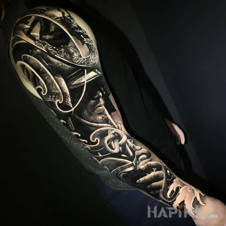 Tattoo Real samurai in black and gray motif and realistic style on the upper arm