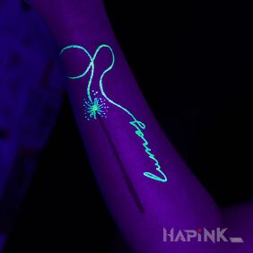 Tattoo Magic wand on the forearm motif: glow in the dark