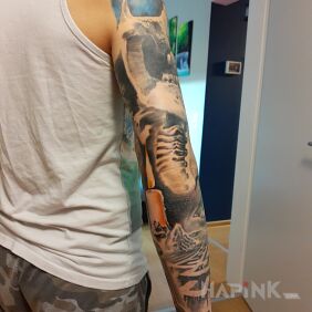 Tattoo Sleeve continuation on the forearm motif: black and gray style: realistic