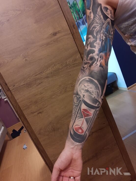 Tattoo Kompas, klepsydra anioł in objects motif and realistic style on the forearm