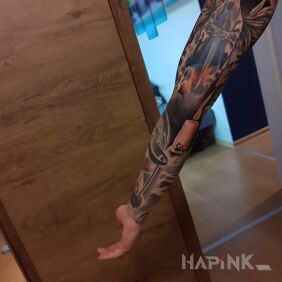 Tattoo Angel on the upper arm motif: black and gray style: realistic