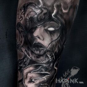 Tattoo Medusa on the forearm motif: demons style: realistic