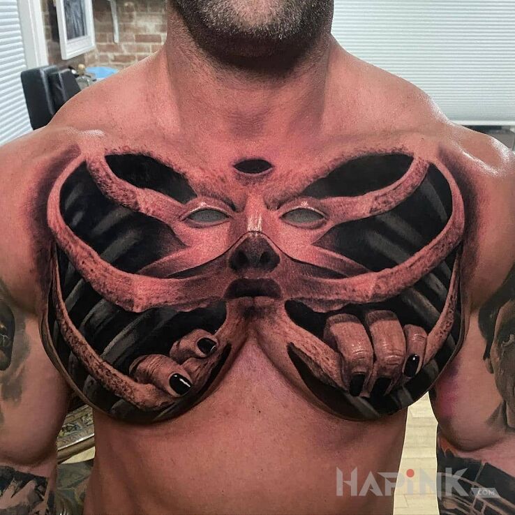 Tattoo Ktoś siedzi w klatce piersiowej in black and gray motif and realistic style on the chest