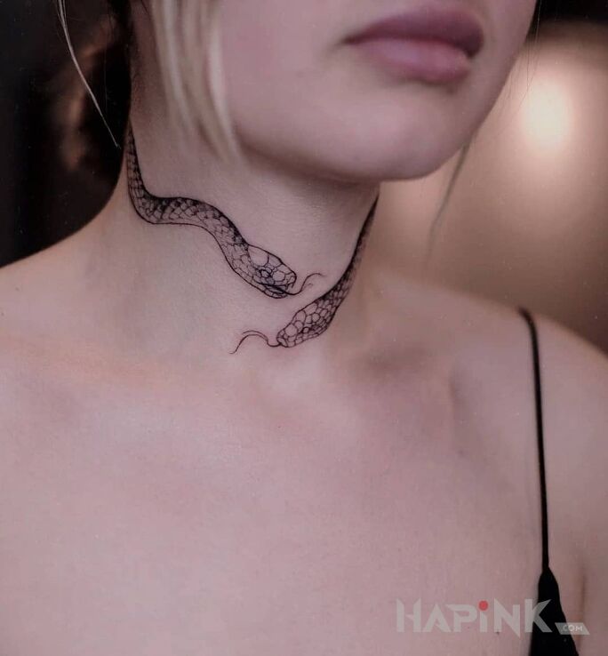 Tattoo Owniety wokol szyi in black and gray motif and graphic / illustrative style on the neck