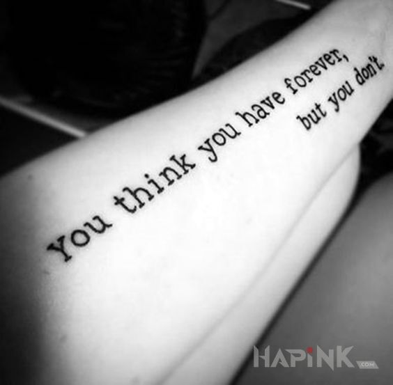 Tattoo Nie masz na to wiecznosci in lettering motif on the forearm