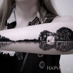 Tattoo Forest landscape on the forearm motif: black and gray style: graphic / illustrative