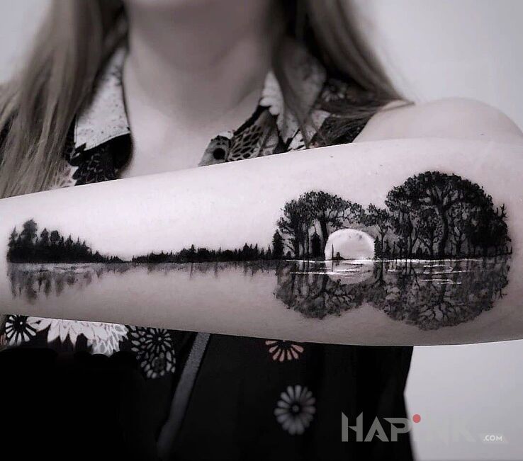 Tattoo Leśny krajobraz in nature motif and graphic / illustrative style on the forearm