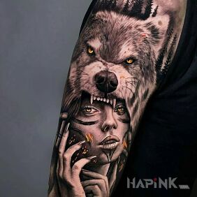 Tattoo She-wolf on the upper arm motif: animals style: realistic
