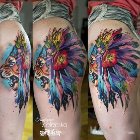 Tattoo Lion / Headdress / Feathers on the leg motif: colorful style: Watercolor