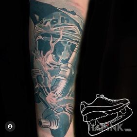 Tattoo Helmet parts automotive on the forearm motif: motorization style: realistic