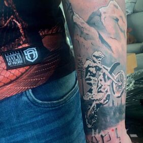 Tattoo Motocross on the forearm motif: characters style: graphic / illustrative