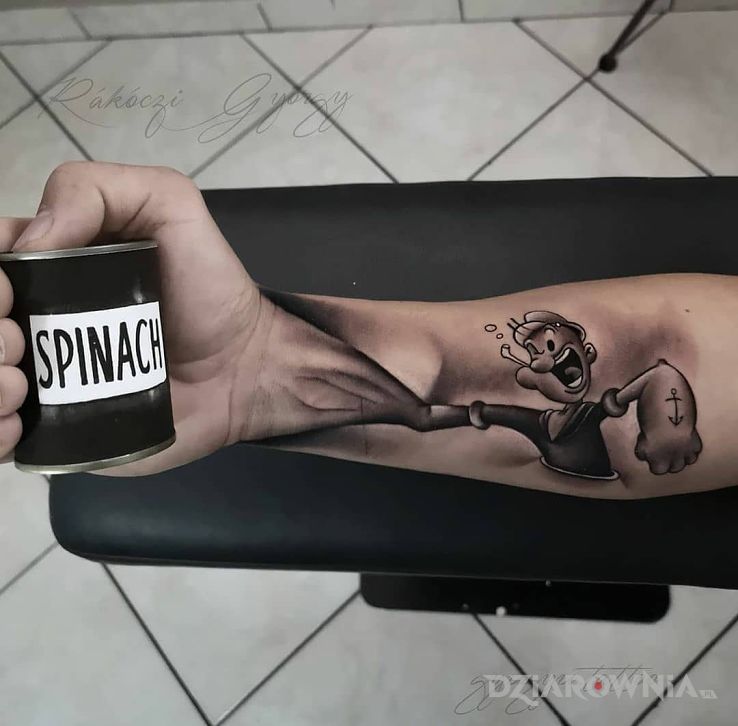 Tatuaż popeye w motywie śmieszne i stylu graficzne / ilustracyjne na przedramieniu