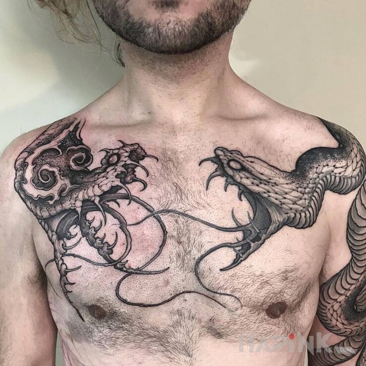 Tattoo Węże na klacie in black and gray motif and graphic / illustrative style on the chest