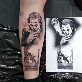 Tattoo Joker on the calf motif: characters style: realistic