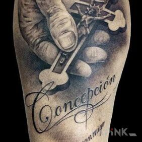 Tattoo Rosary tattoo on the calf motif: objects style: realistic
