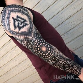 Tattoo Paw in Scandinavian style on the forearm motif: ornaments style: Celtic / Nordic