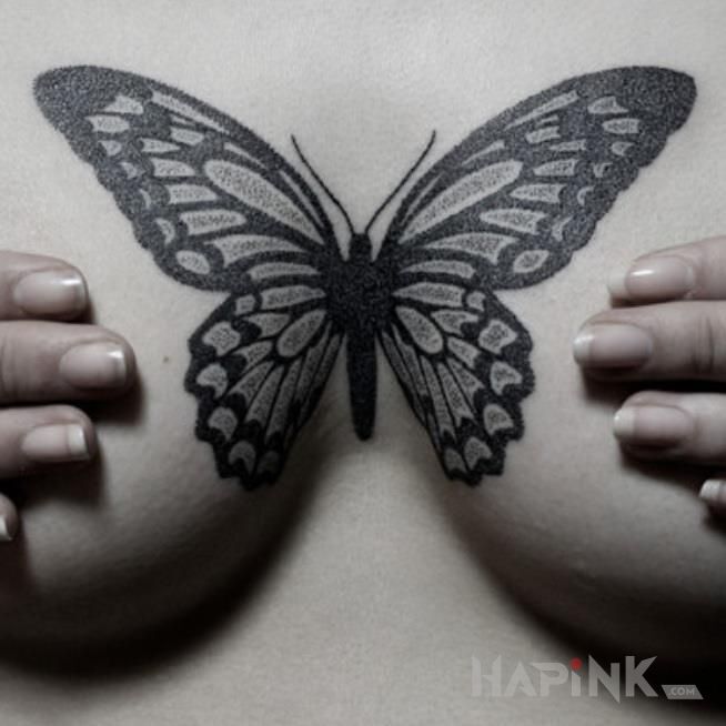 Tattoo Czarny motyl in butterflies motif and graphic / illustrative style on the breast