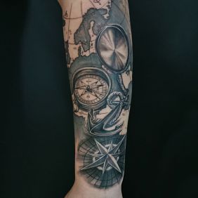Tattoo Compass map On the arm motif: black and gray style: realistic