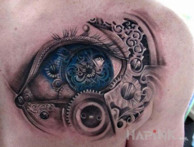 Tattoo Oko po steampunkowemu in steampunk motif and realistic style on the shoulder blades