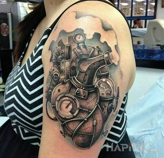 Tattoo Serce napędzane parą in objects motif and realistic style On the arm