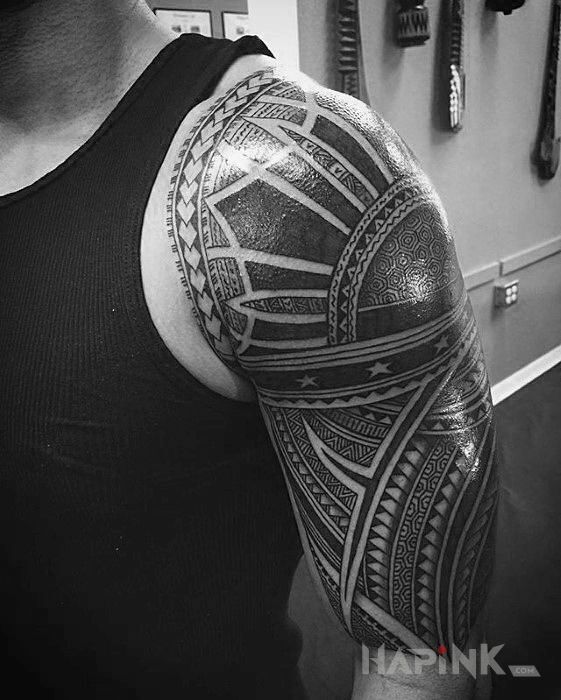 Tattoo Ramie z Polinezji in black and gray motif and Polynesian style On the arm