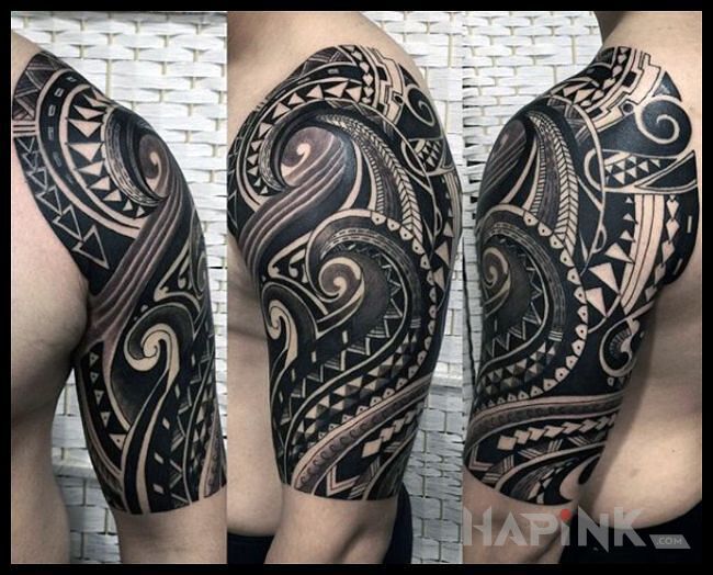 Tattoo Macki wplecione w motywy polinezyjskie in black and gray motif and Polynesian style On the arm
