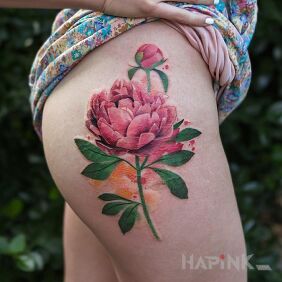 Tattoo Red flower on the leg motif: flowers style: realistic