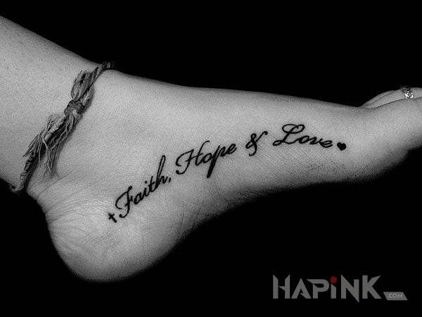 Tattoo Faith, hope adn love in lettering motif on the foot