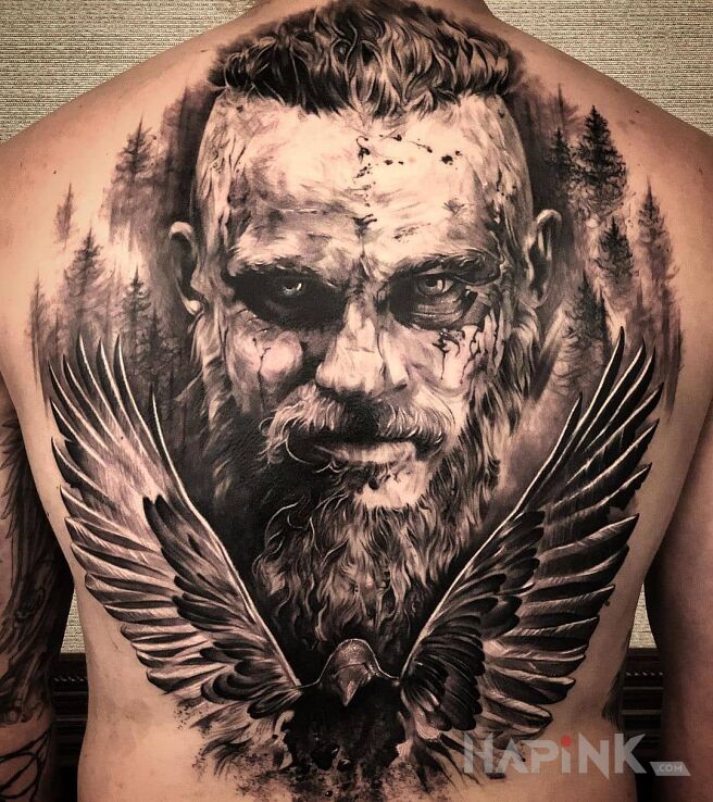 Tattoo Wiking Ragnar in faces motif and realistic style on the back
