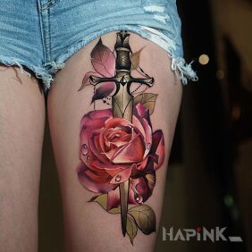 Tattoo Rose pierced by a dagger on the leg motif: floral style: neo-traditional