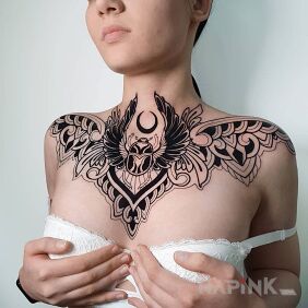 Tattoo Scarab on the collarbone motif: black and gray style: graphic / illustrative