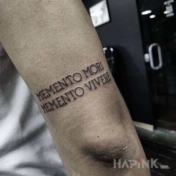 Tattoo Memento in lettering motif On the arm