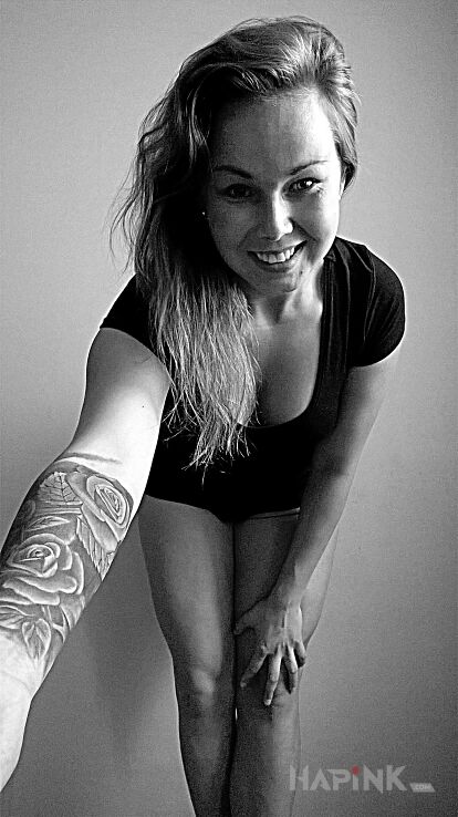 Tattoo Moje maleństwo <3 in flowers motif on the forearm