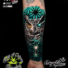 Tattoo Old tattoo cover-up on the forearm motif: animals style: geometric