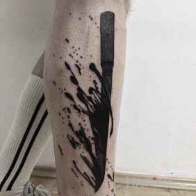 Tattoo Bloody tantō on the leg motif: black and gray style: blackwork / blackout