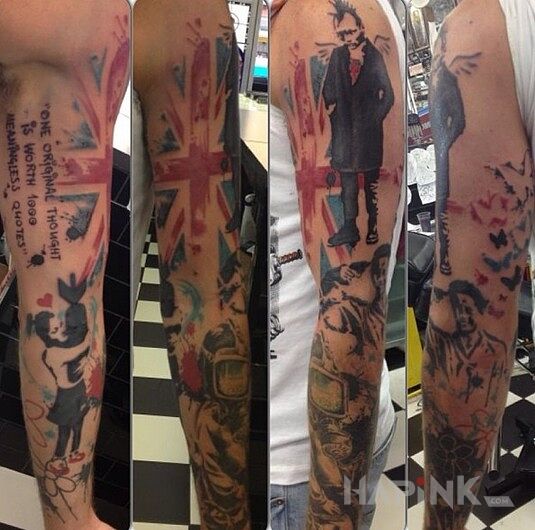 Tattoo Rekaw punka in sleeves motif on the forearm
