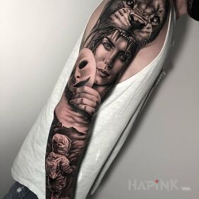Tattoo Woman with a mask On the arm motif: faces style: realistic